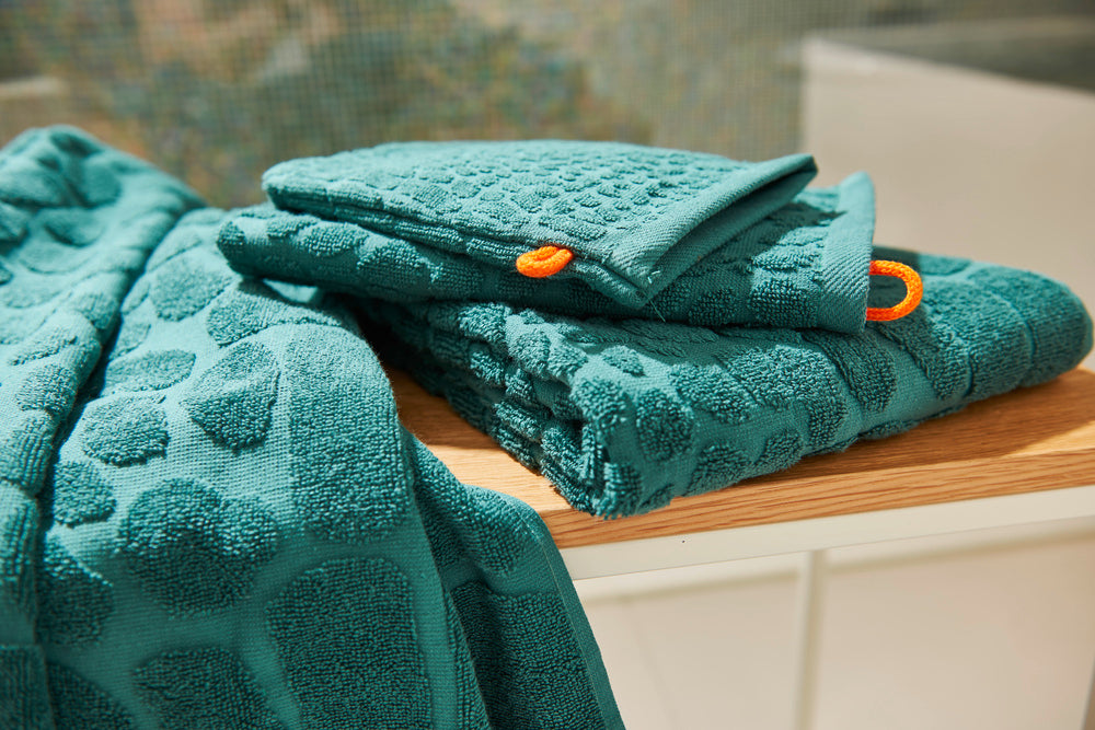 Die Kunst der Gastfreundschaft: Alles über Gästehandtücher und Duschtücher